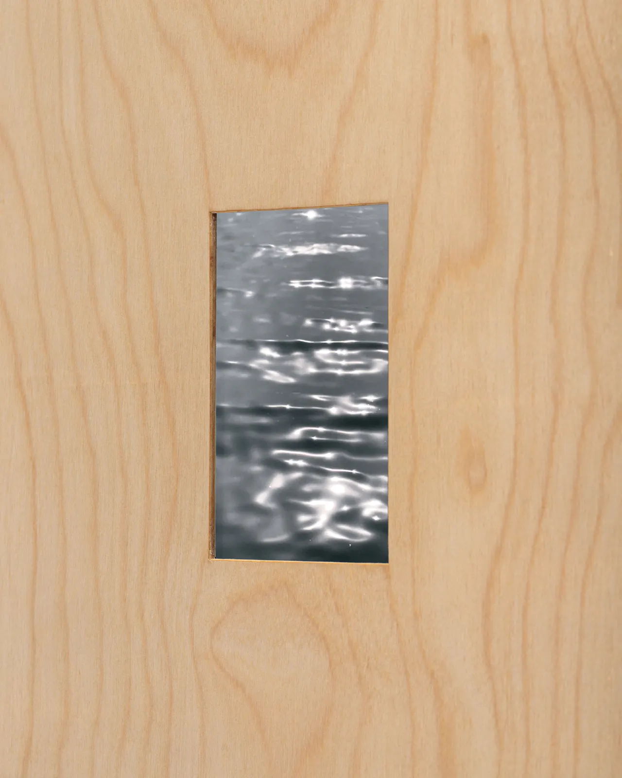 Single-channel video loop, electronic components, birch plywood, cloth-covered cord